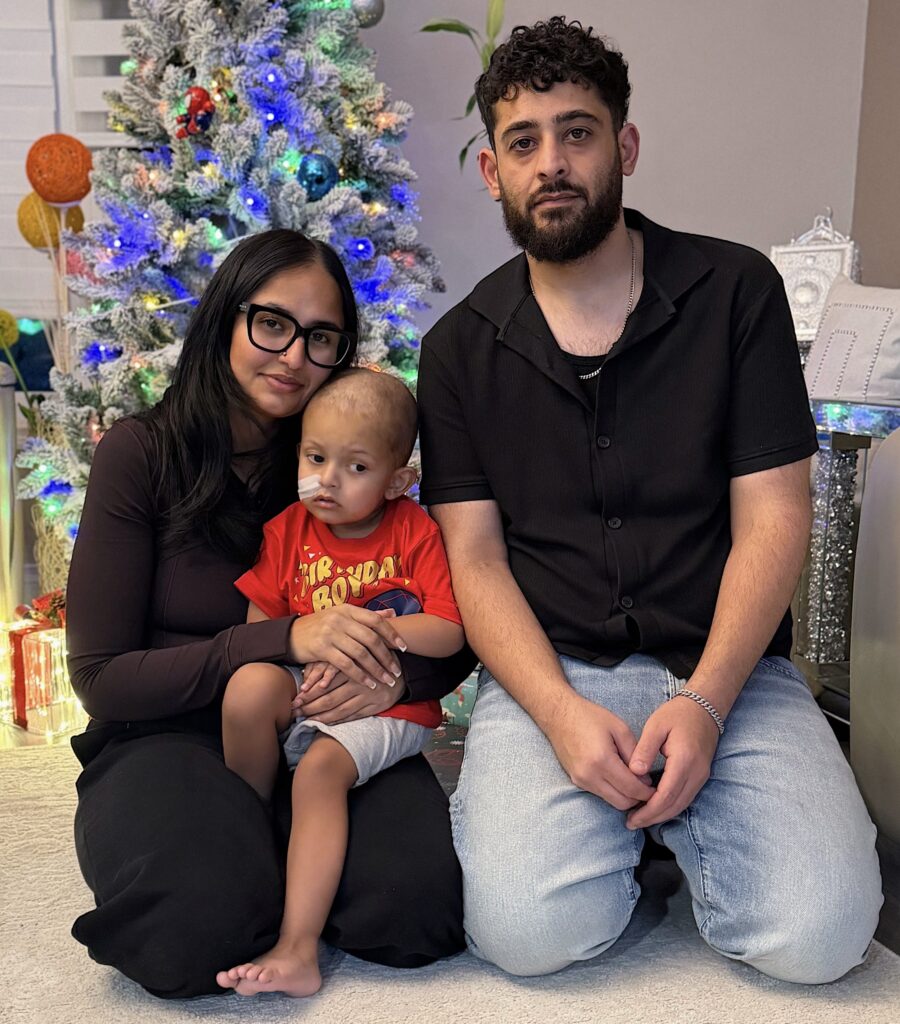 Rayan with his parents