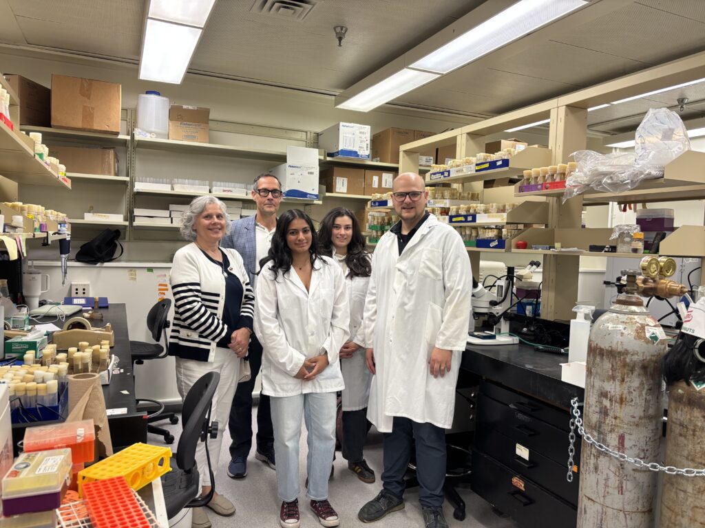 Dr. Marcogliese (right) with his team in their CHRIM lab.