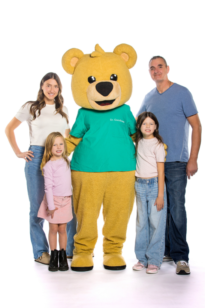 Ireland and her family with Dr. Goodbear.