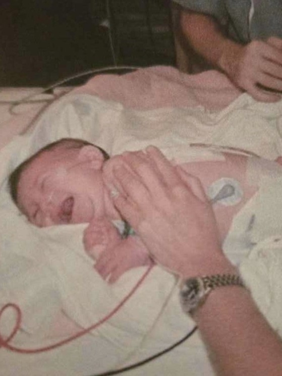 Sage in the hospital as a baby
