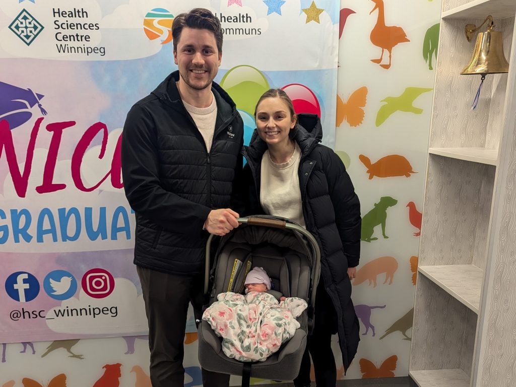 Parents Patrick and Cassidy with baby Juliette leaving the NICU.