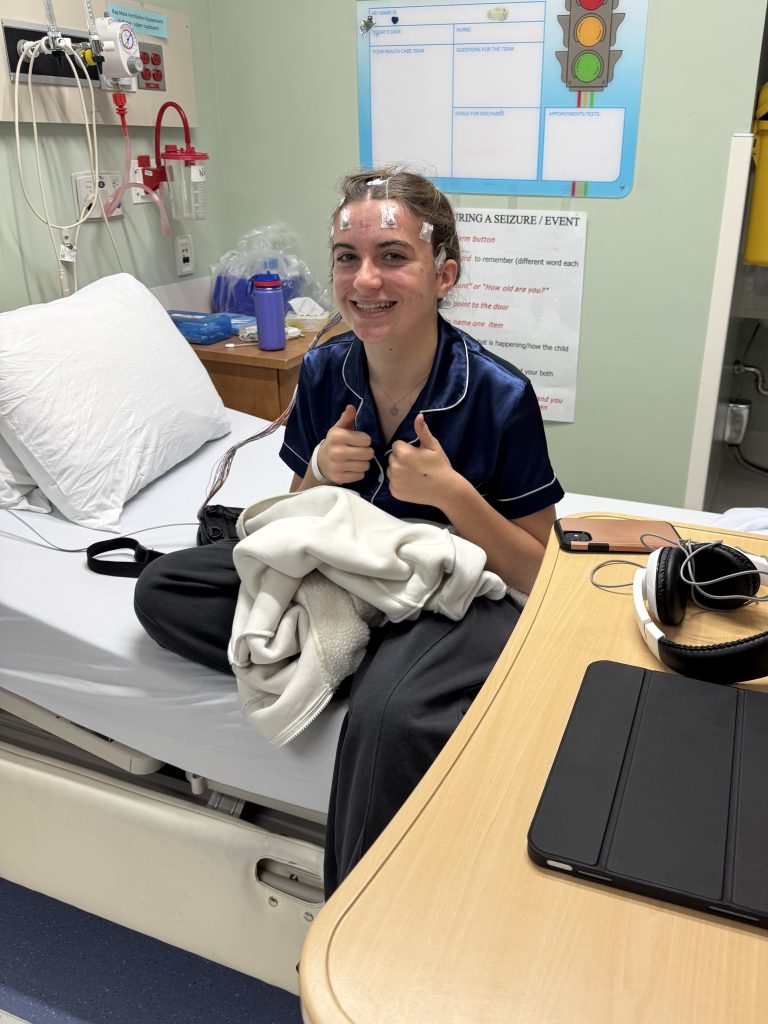 Cloe in her hospital bed during her EEG study