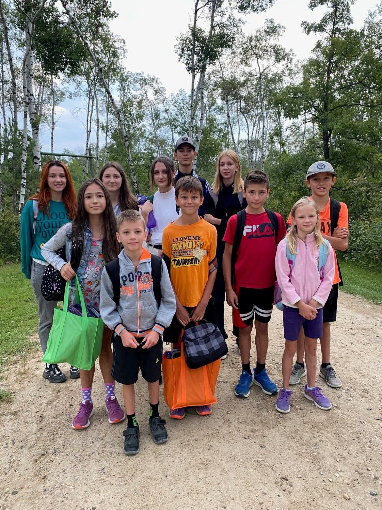 Fallon poses for a photo with her 10 siblings before heading to school.